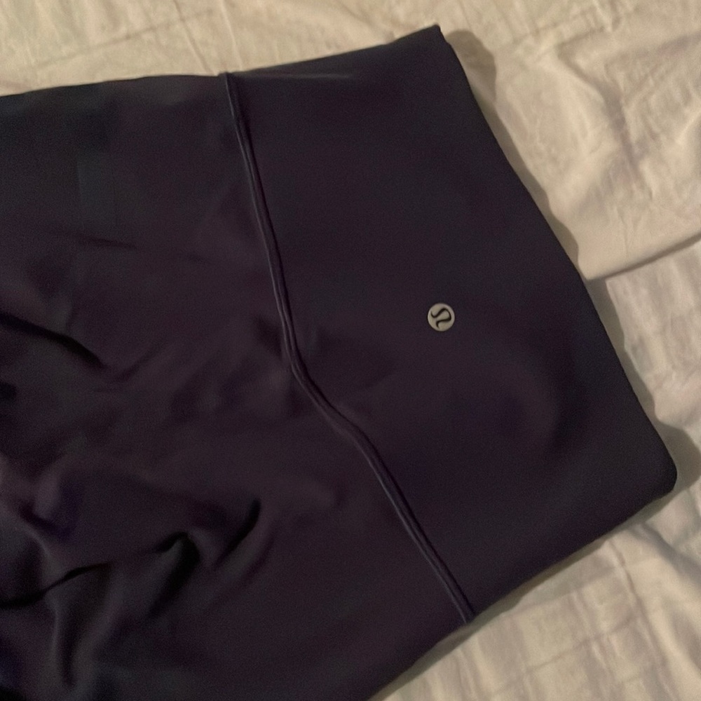 Blue lulu lemon align size 4 with logo on side. Worn twice.